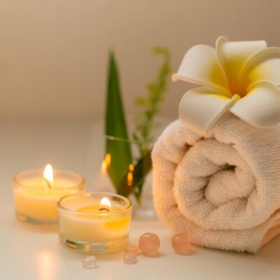 still-life-spa-setting-with-pink-stone-aroma-scent-candle-plumeria-flower-thai-spa-massage-spa-treatment-cosmetic-beauty-aromatherapy-care-relax-wellness-aroma-salt-scrub-healthy-lifestyle_52476-536